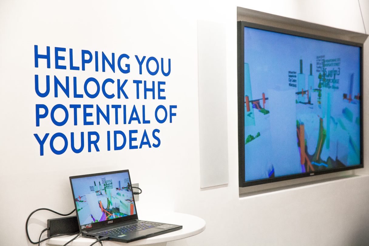 A laptop screen showing a digital twin company coding platform and software engineering work.