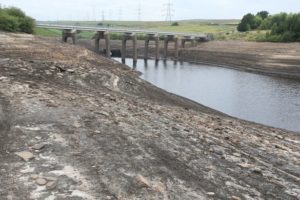 empty reservoir showing a UK drought